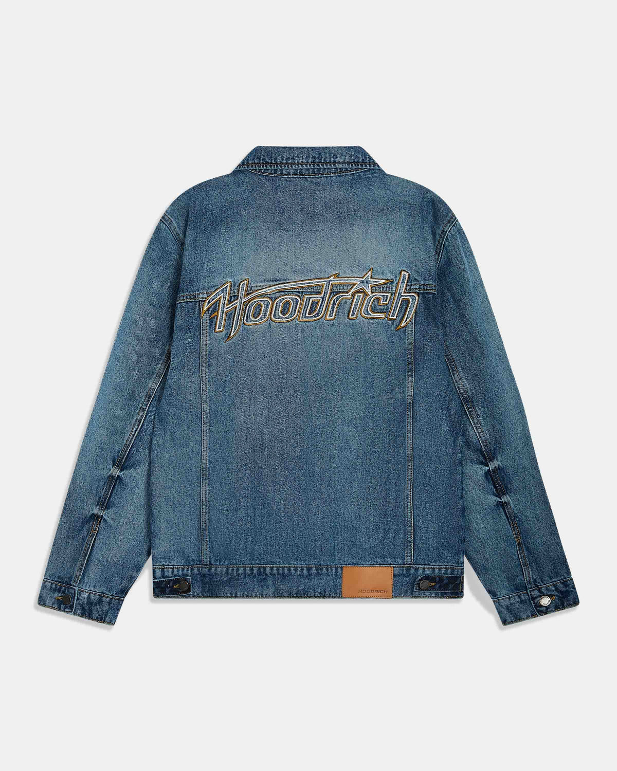 A blue denim jacket shown from the back, featuring a large embroidered 'Hoodrich' logo across the upper back in gold and white, set against a light gray background.