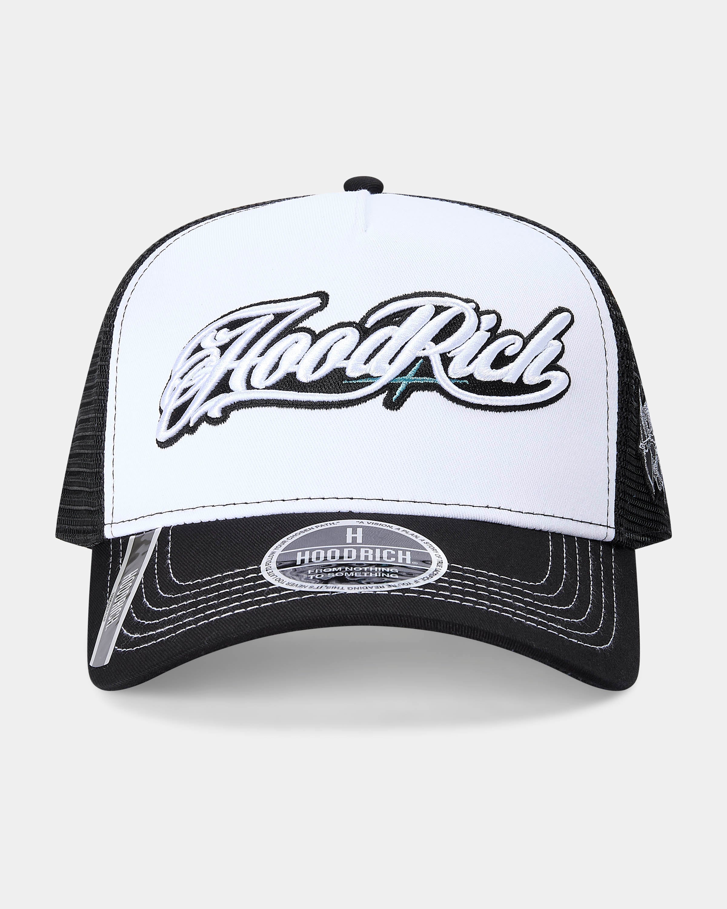 Black and white cap with 'Hood Rich' branding on a light gray background