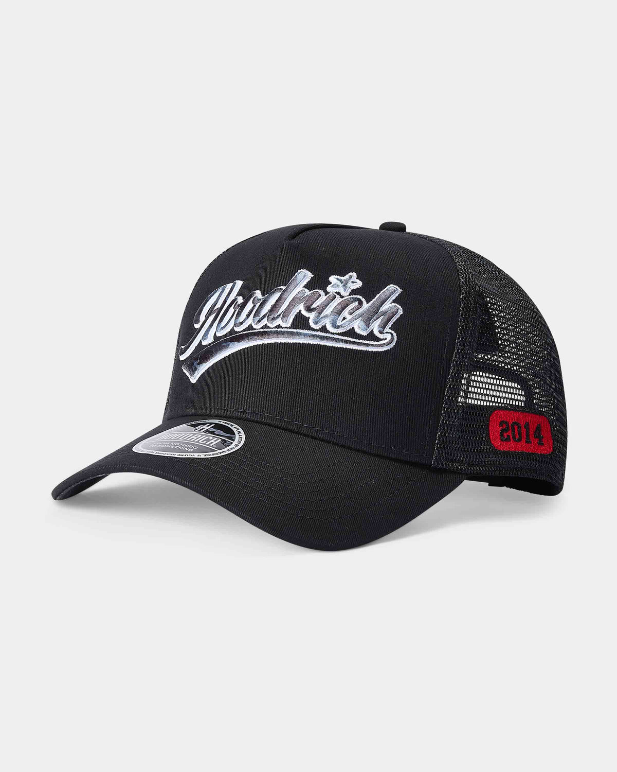 A black trucker-style baseball cap with a curved brim, black mesh back, and a white embroidered script logo on the front. A small red patch on the side mesh reads '2014'.