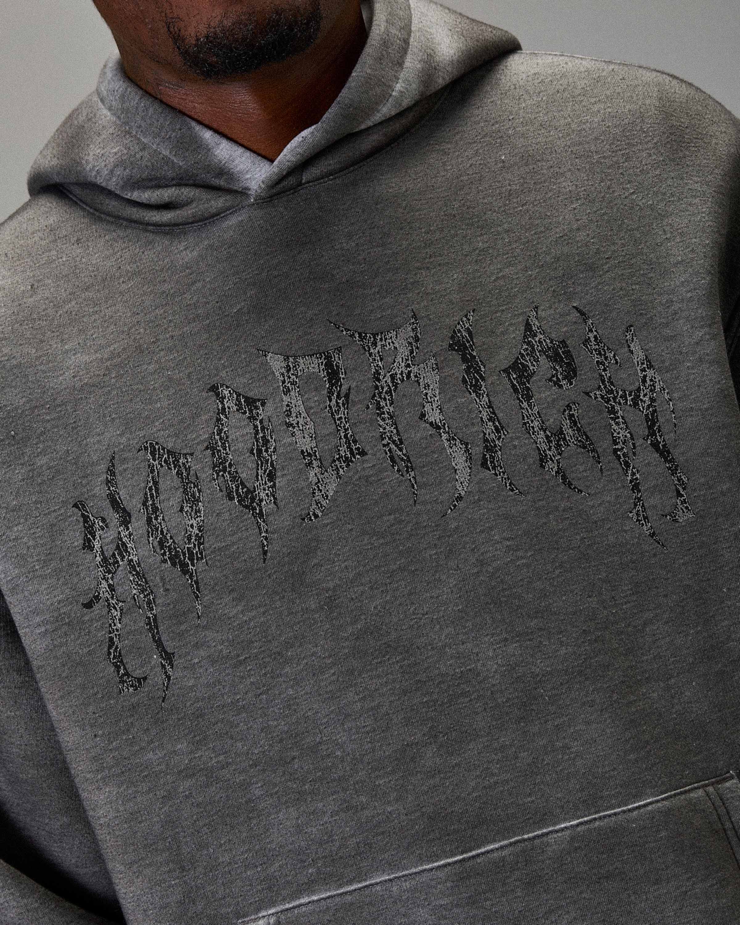 Gray hoodie with 'Hoodrich' text design on a gray background